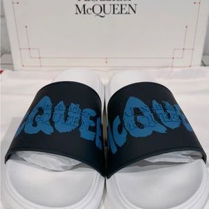 Alexander McQueen Graffiti logo print sandals.